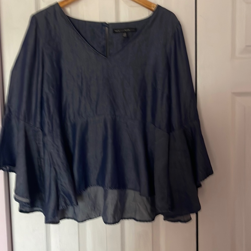White House Black Market navy blouse with peplum and bell sleeves